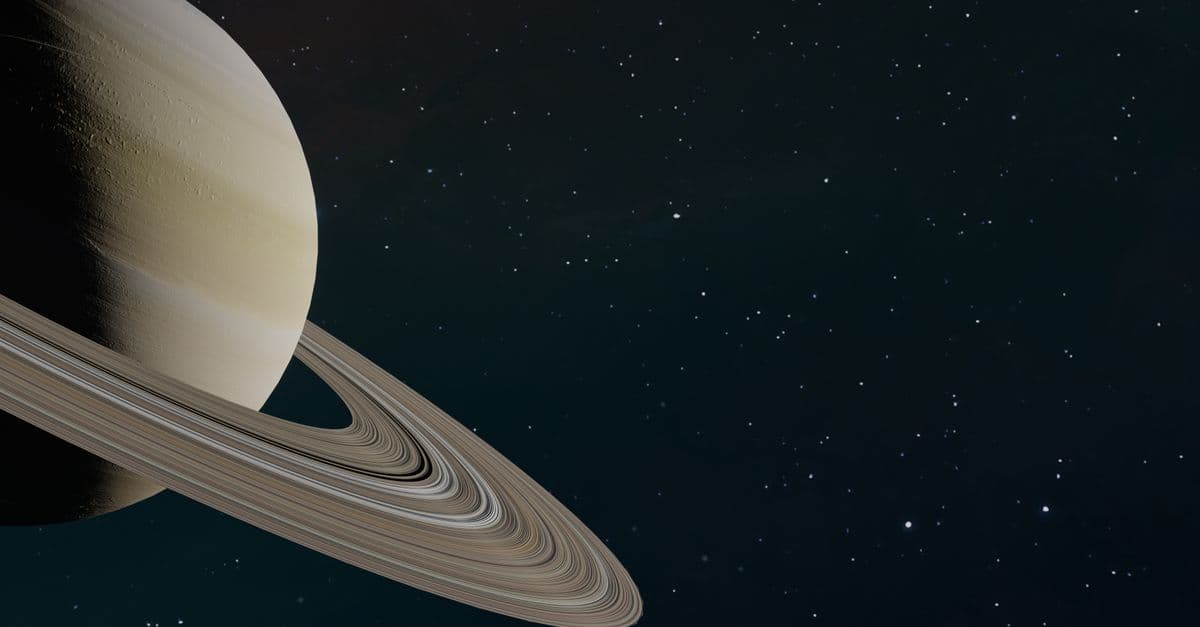 Uzayda Satürn gezegeninin halkaları ve yıldızlı arka plan
